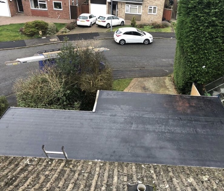 Flat rubber roof repair near me