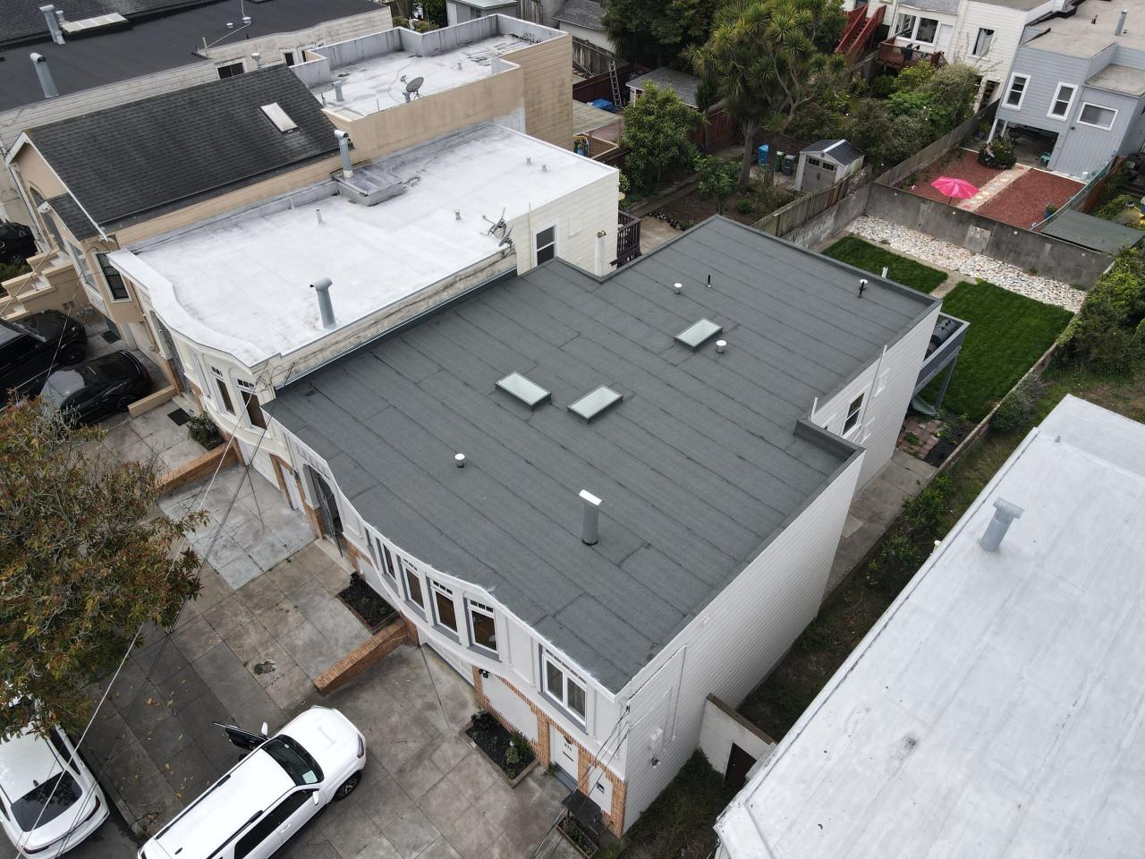Cost to replace a flat roof per square foot