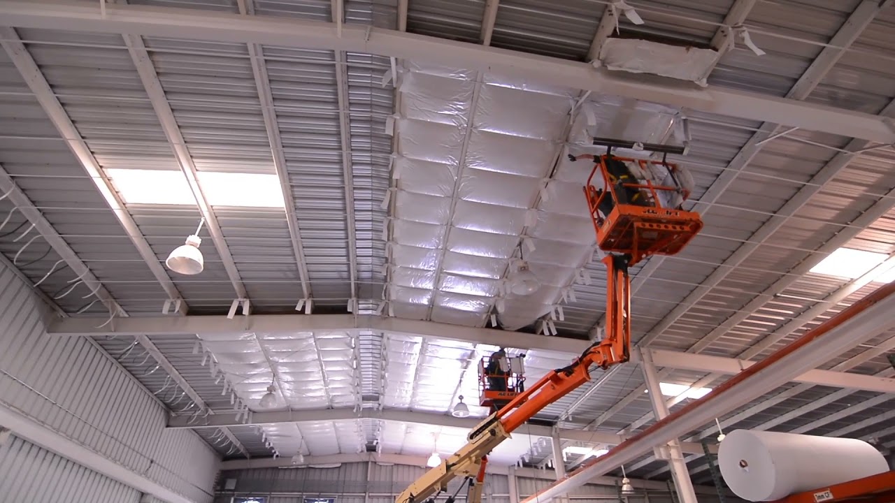 Insulation for metal building roof